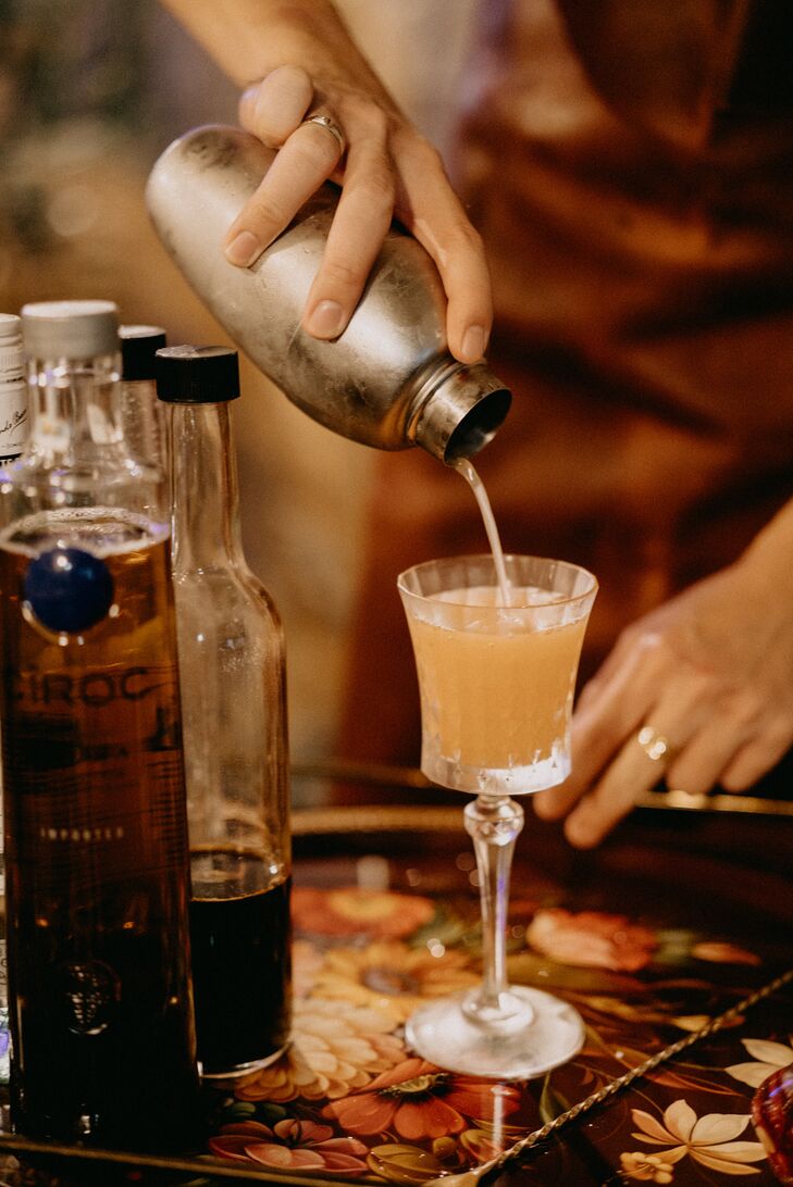 Mixologist Pouring Wedding Signature Cocktail