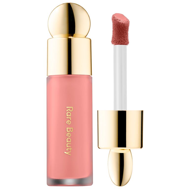 Rare Beauty liquid blush in light pink. 