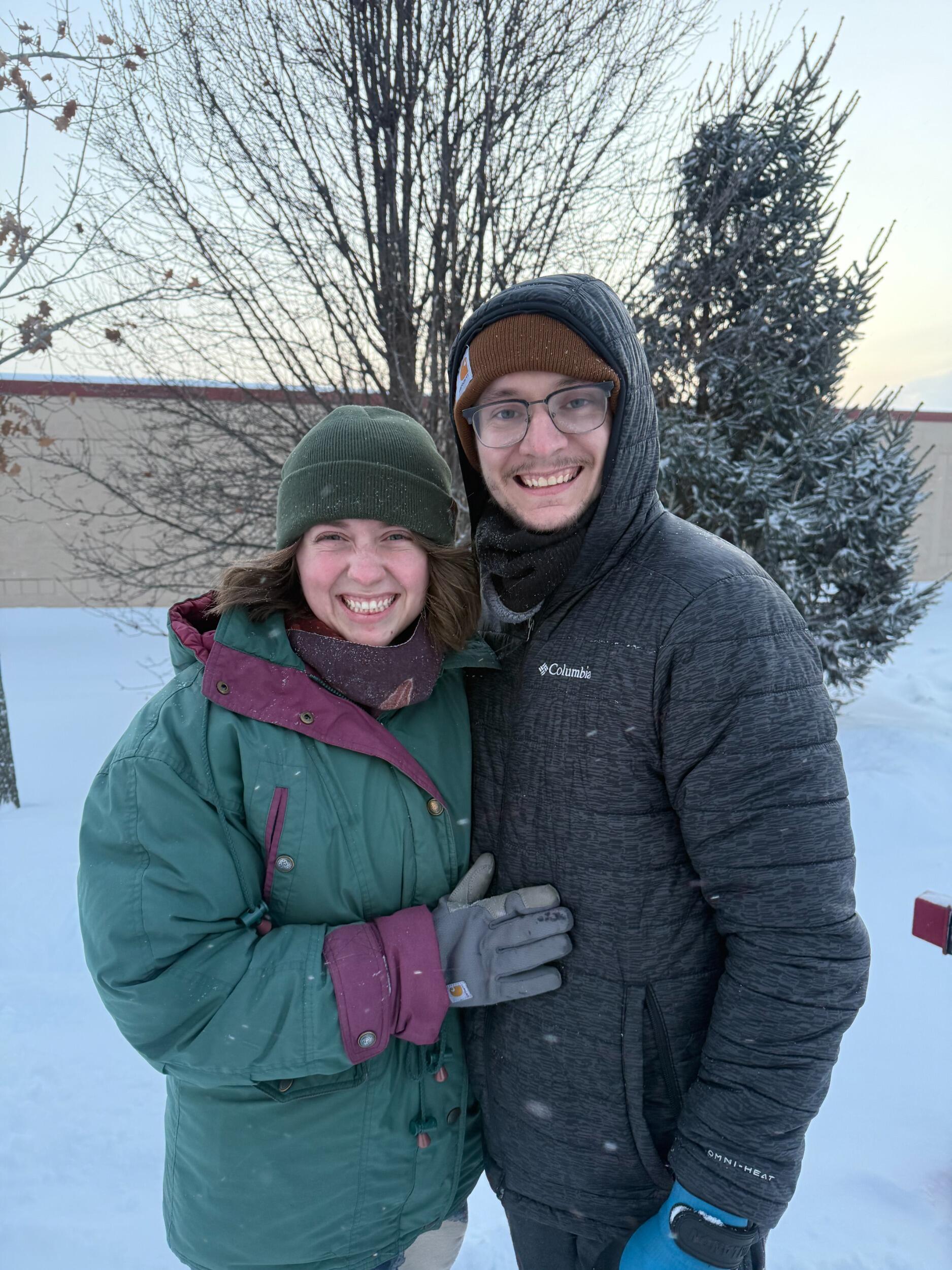 Since moving to the Midwest, John Michael and Nicole have learned to brave subzero temperatures, gusts of wind, and 13+ inches of snow. They are excitedly awaiting the wedding and look forward to celebrating with all their family and friends!