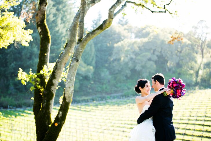 Jennifer and Eric used vibrant jewel tones to dress their vineyard wedding.