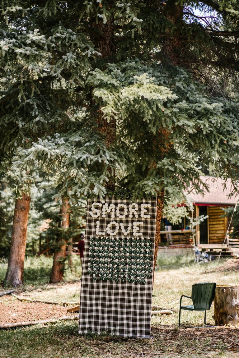 S'more escort card display at mountain wedding