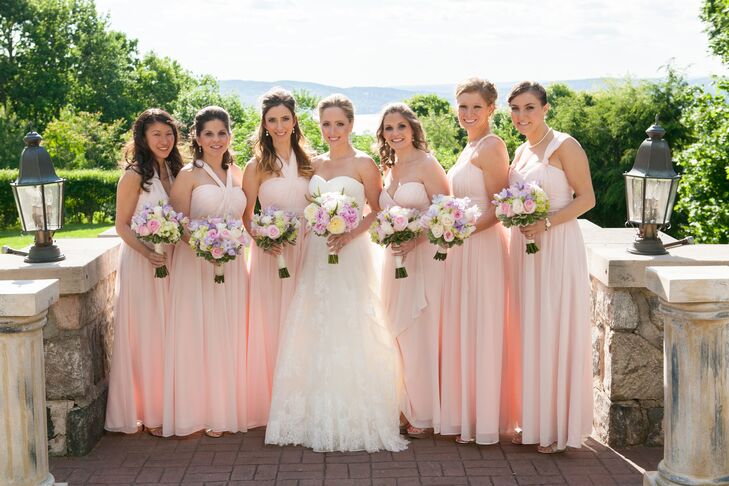 Lindsay's six bridesmaids wore romantic blush Jenny Yoo dresses with various necklines.