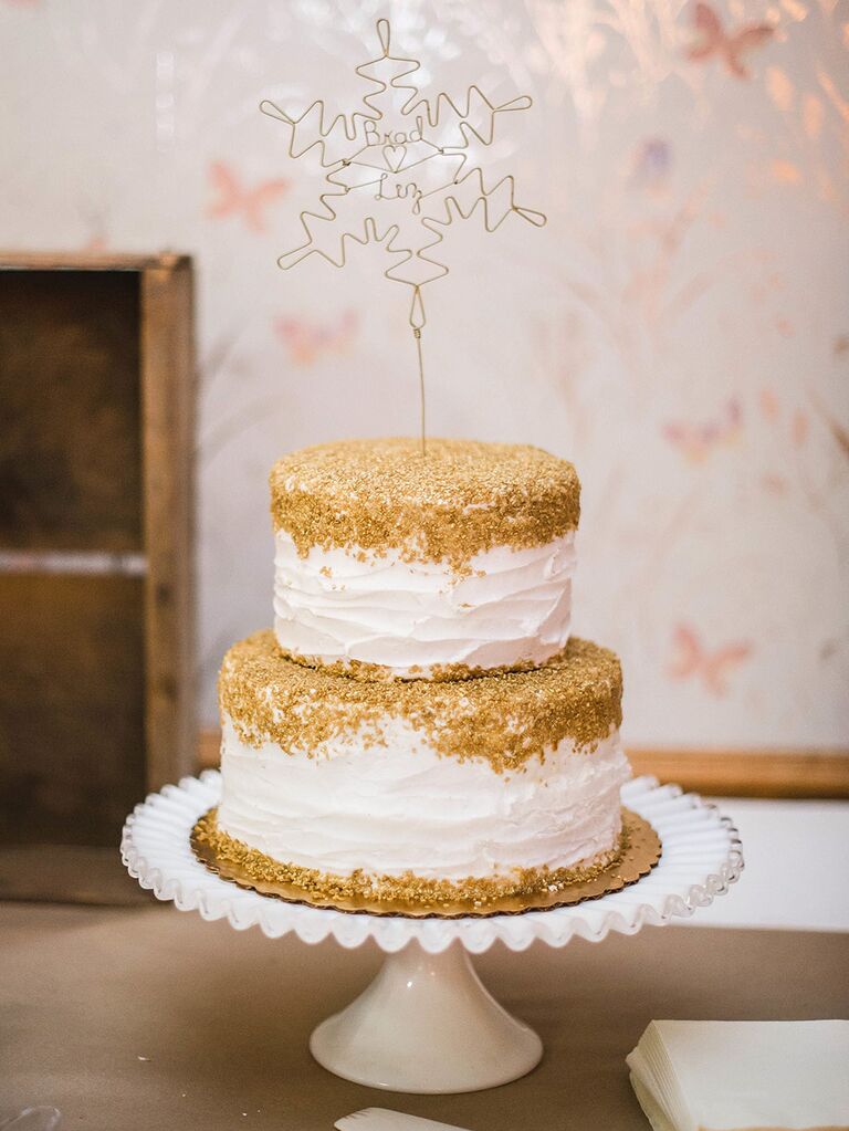 Winter wedding cake with snowflake cake topper
