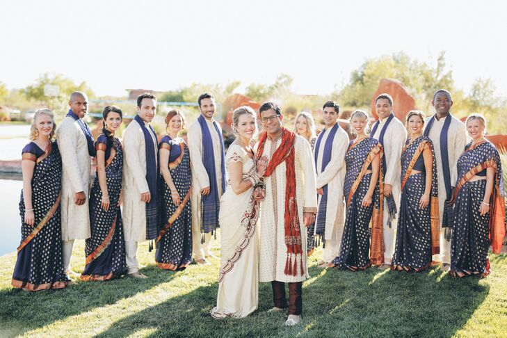 The bridesmaids wore blue and gold saris; the groomsmen wore a cream color palette.