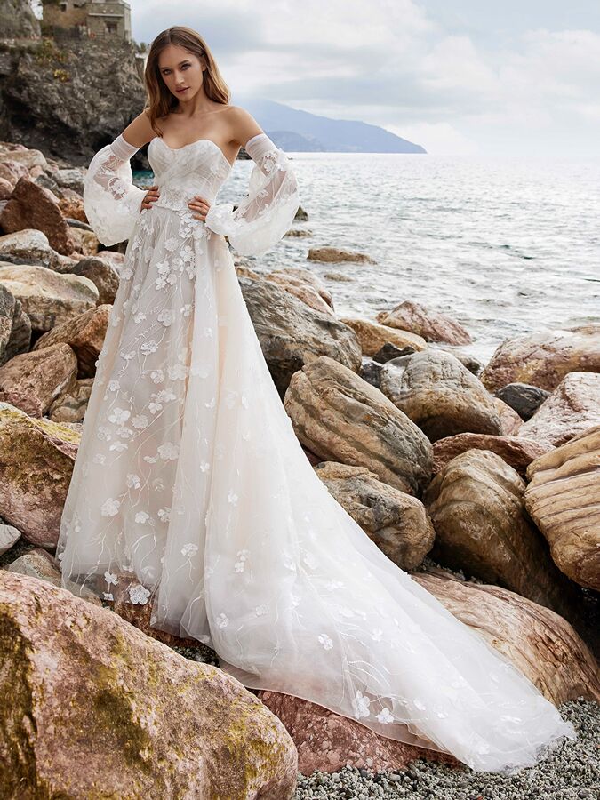 Ines by Ines Di Santo strapless trumpet wedding dress with detachable sleeves.