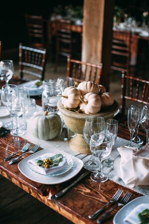 Cinderella Pumpkin Centerpieces in Earthy Pedestal Vases
