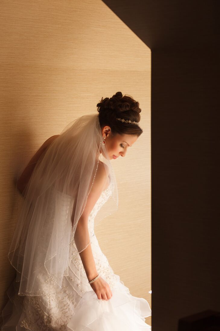 “Karen loves sparkle and knew that had to be incorporated on the dress,” says Kirk. “It was difficult to find one that fit the winter snow princess idea exactly to her liking but finally decided on a gorgeous Christina Wu gown with lots of sparkle.”