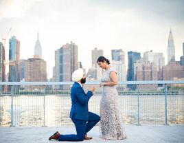 Surprise proposal in front of NYC skyline