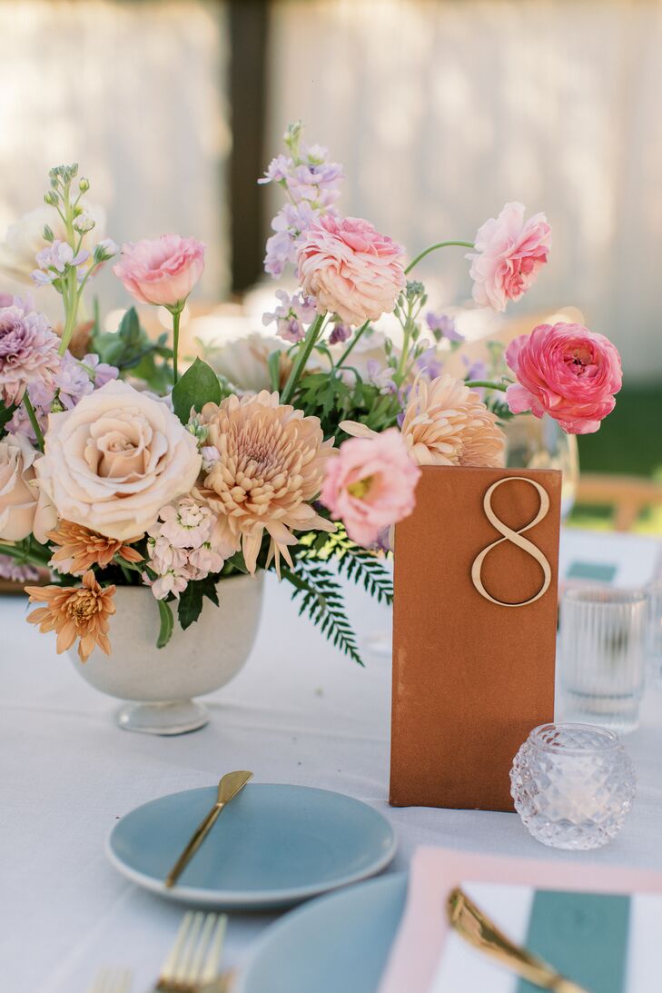 Wooden Table Number With Pastel Floral Arrangement on Table
