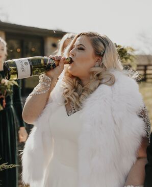 Glamorous Bride Sips on Champagne