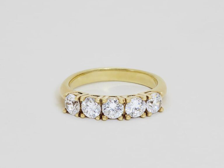 ring with five recycled diamonds on domed band