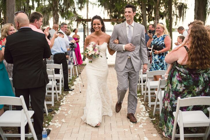 Chad knew exactly what he wanted for his look and had every piece just two months into their engagement. He went with his groomsmen to JoS. A. Bank and chose a light gray suit with a matching white shirt, white pocket square and silver tie. As for the footwear, he went with a pair of brown dress shoes.
