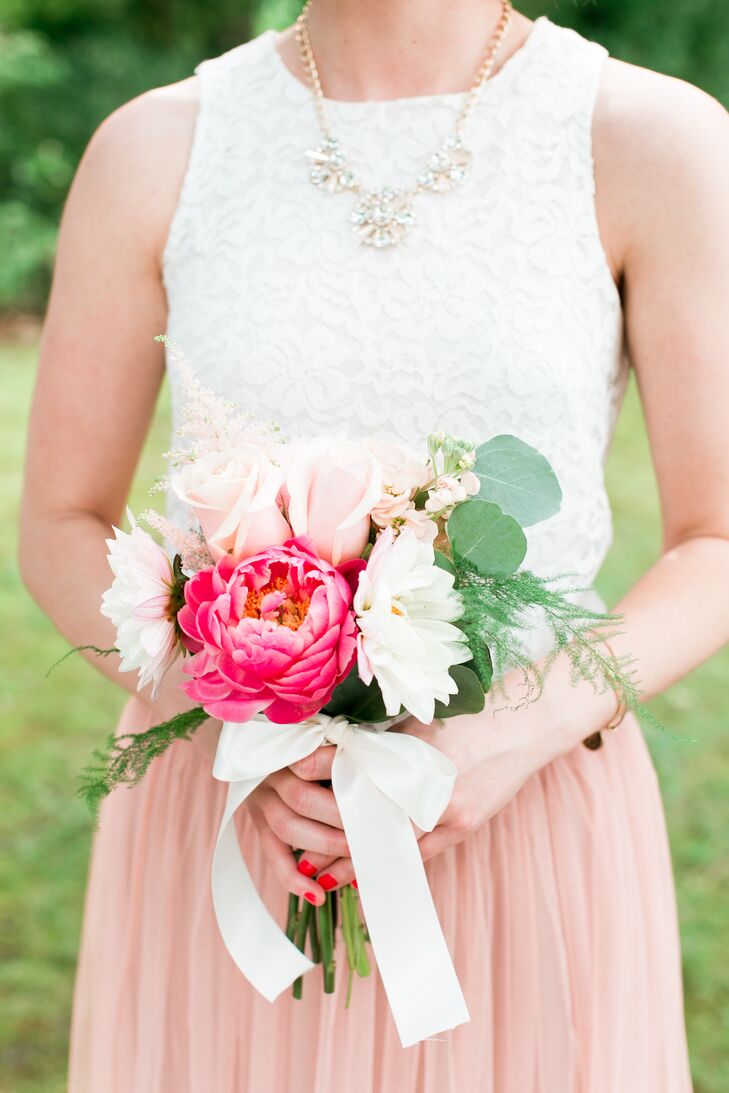Jamie gave her bridesmaids different statement necklaces that echoed their styles and personalities. Using mismatched jewelry allowed each girl’s personality to shine through without compromising the uniform look of the wedding party.
