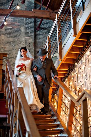 Bride and Father Walking Down Stairs