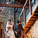 Bride and Father Walking Down Stairs