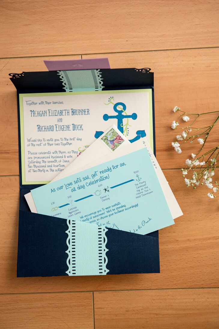 Meagan designed her own nautical-themed invites for her wedding. The paper goods featured anchor motifs and were made to resemble boarding passes, complete with navy fold-over envelopes and aqua accents.