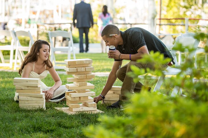 "Rich and I entertain a lot at our house. We have a big yard and play lots of yard games with friends. We wanted our wedding to feel like a big backyard party. During cocktail hour, corn hole, ladder golf and lawn Jenga were set up for our guests to enjoy."