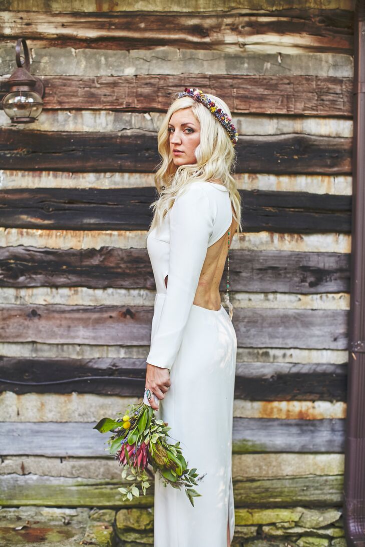 Angela wore Cheyne by Houghton, an ivory silk crepe long-sleeve modern gown with an open back. “It was sexy, timeless, unique and beautifully simple,” Angela says. “I felt more stunning than ever in that dress. It reminded me instantly of Cameron and how he has changed my life with his minimalist demeanor.”
