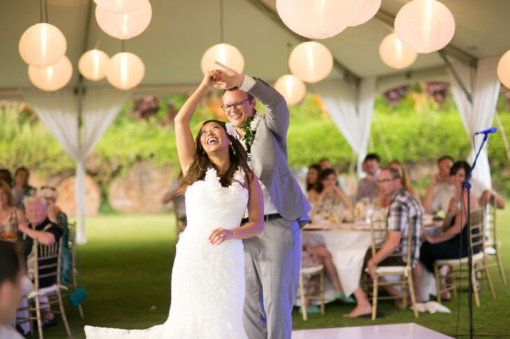 Evelyn and Neil had their first dance under the white tent at the reception, with paper white lanterns hanging above.
