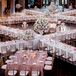 When Aimee and Larry's guest list grew to 280, they made the bold decision to arrange their tables in two giant Xs. "We wanted to encourage conversation," Aimee says. "And what we received far exceeded our expectations."
