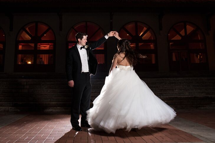 Kathleen wore an ivory Lazaro ball gown with a silk sweetheart neckline, tulle skirt and beaded belt. She loved the full silhouette and how it flowed around her. She completed her look with her hair in a half-up hairstyle and a necklace from Alan.