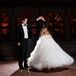 Kathleen wore an ivory Lazaro ball gown with a silk sweetheart neckline, tulle skirt and beaded belt. She loved the full silhouette and how it flowed around her. She completed her look with her hair in a half-up hairstyle and a necklace from Alan.