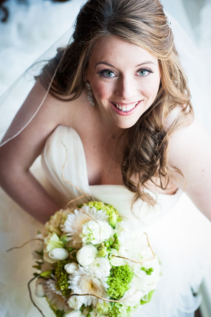 Shannon went in a romantic, whimsical direction when it came to her bridal look, donning a statement-making mermaid gown from Allure. For her hair and makeup, Antonette White struck the perfect balance of elegance and romance, styling Shannon’s hair into a curled half updo and playing up her eyes with a subtle swipe of eyeliner.