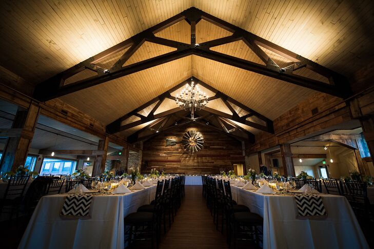 On their first visit to Fishermen’s Inn in Elburn, Illinois, Shannon and Tom knew that the historic landmark was the perfect fit for their wedding. “It had come under new ownership and when we walked in during renovation, we fell in love with their vision. The staff was so kind and shared in the creation of our dream wedding,” Shannon says. “From the quaint watermill, bridges, and ponds outdoors to the picturesque barn wood wall and spiral staircase, the setting was something out of a magazine.”