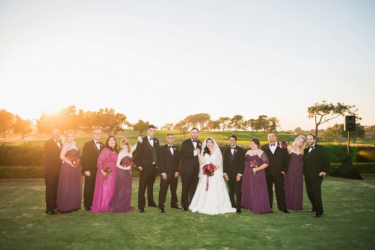 Outside at the Lodge at Torrey Pines in San Diego, California, Cassandra and Stephen stood with their wedding party dressed in plum and black accents. The bridesmaids wore plum floor-length dresses designed by Alfred Angelo, while the groomsmen sported a classic style and wore black tuxedos from Men's Wearhouse.