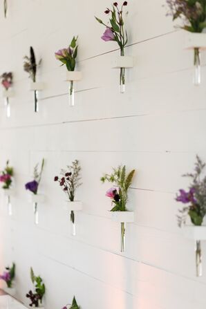 White Accent Wall with Purple Wildflower Installation