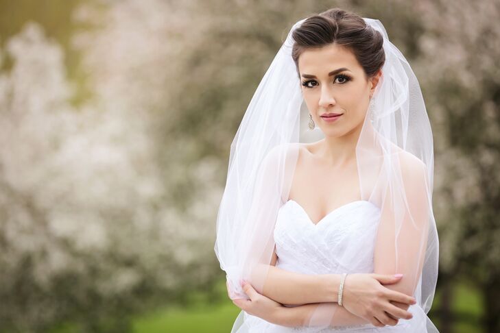 Bride With Crystal Drop Earrings and a Crystal Bracelet