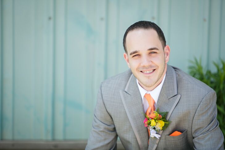 Since orange is Joey's favorite color, he elected to wear an orange boutonniere, tie and pocket square. He also wore orange socks.