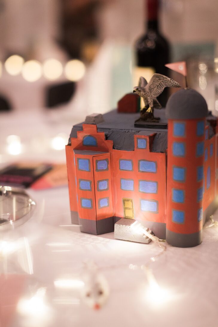 The dining tables at the reception each featured centerpieces based on different Wes Anderson movies. One of the tables had a model of the house from 'The Royal Tenenbaums.'