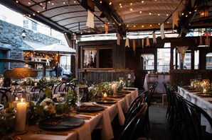 Rooftop Reception Space, Long Tables in Low Lighting, Black Details, String Lights, Art Deco