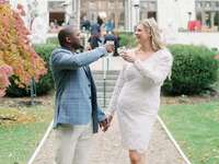 A bride and groom toast themselves on their wedding day