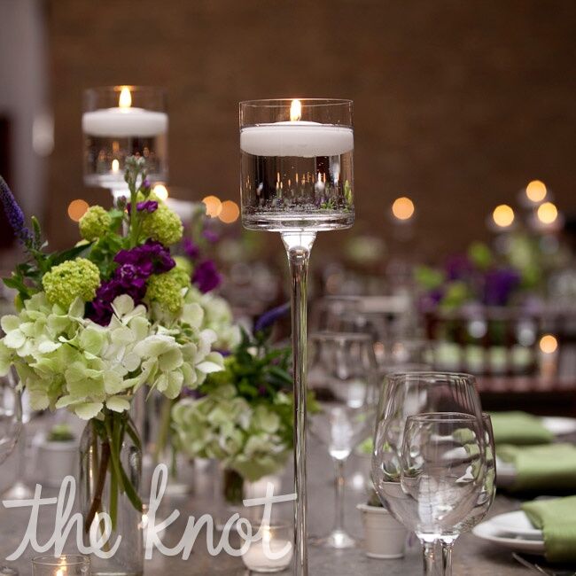 Candles and bunches of flowers topped the tables.