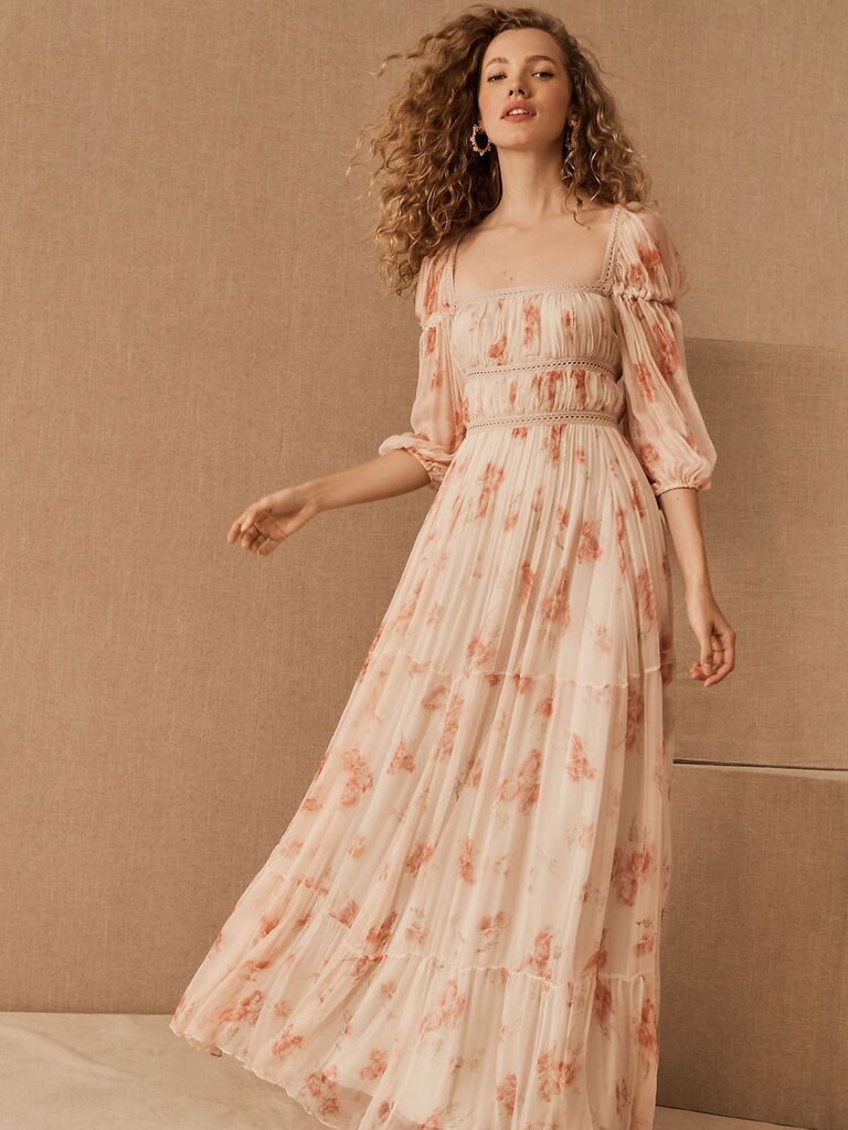 Light pink floral print fall wedding guest dress with sheer 3/4 length sleeves