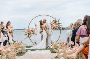 First Kiss During Waterfront Wedding Ceremony at Wequasset Resort in Harwich, Massachusetts