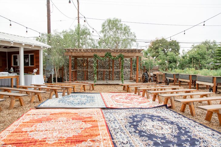 Rug-Laden Ceremony Aisle at Riverbed Farms in Anaheim, California