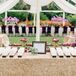 Glittery linens topped the escort card table, where guests found their table assignments on formal cards placed into rows.