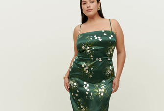 green slip fitted dress with floral pattern and spaghetti straps
