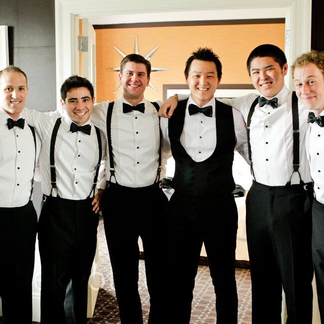 The groomsmen wore suspenders and bow ties with their black tuxedos.