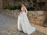 Full feather skirt and asymmetrical long sleeve