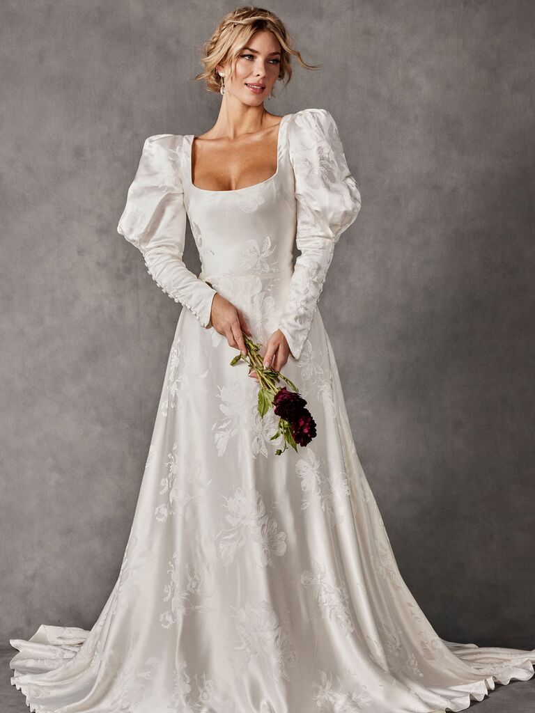 Long sleeved wedding dress by Rebecca Schoneveld. 
