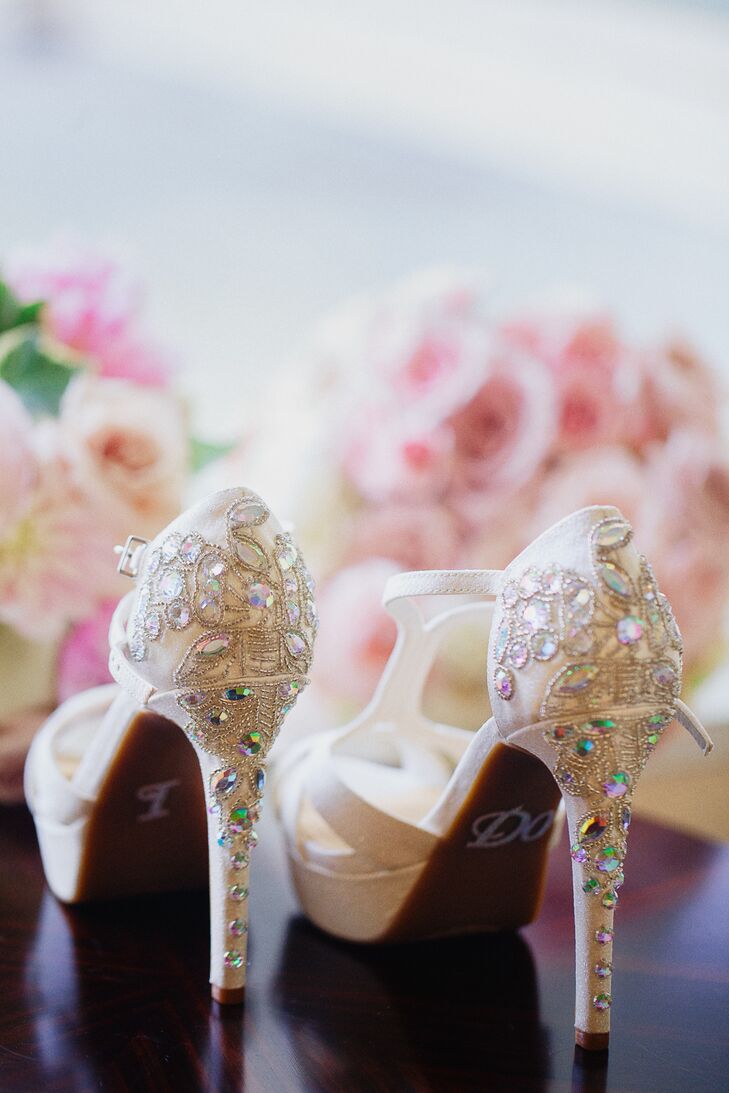 “I wanted comfort with a lot of height,” Shayna says. The bride wore ivory heels with crystal embellishment.