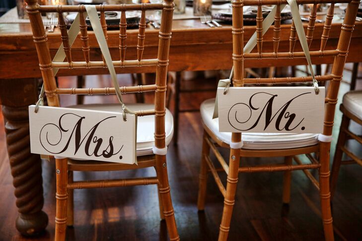 Chairs with "Mr." and "Mrs." Signs