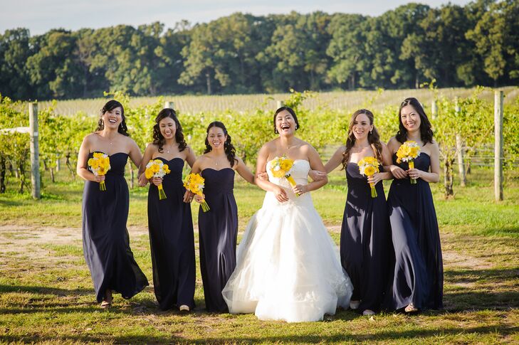 The bridesmaids wore floor length navy gowns while Jennifer whore a Vera Wang classic ballgown.