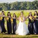 The bridesmaids wore floor length navy gowns while Jennifer whore a Vera Wang classic ballgown.