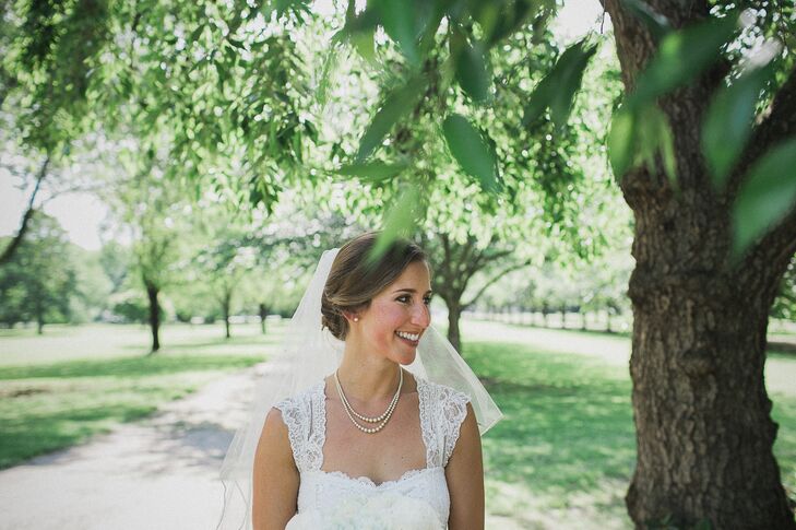 Bride in a Lace Wedding Dress and Pearls