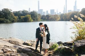 Couple Sharing Kiss in Front of Reservoir at Central Park